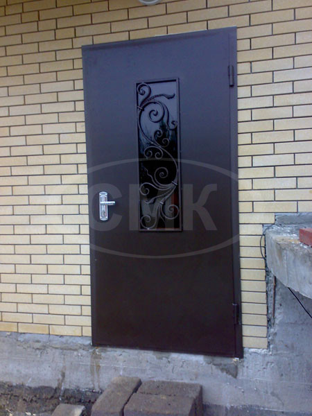 Дверь металлическая с ковкой с окном изготовление на заказ .
